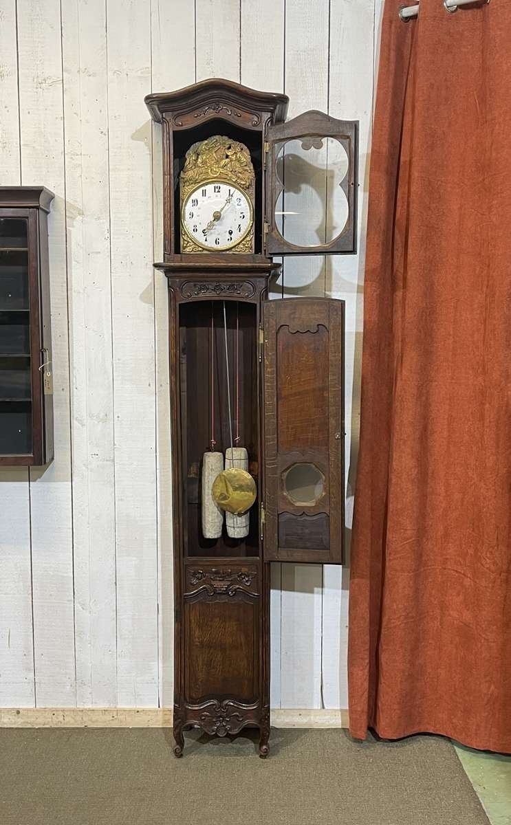 Horloge Louis XV en chêne  du 19ème siècle