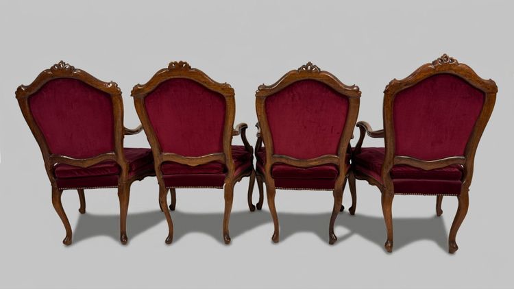 Four walnut armchairs, Venice, 18th century