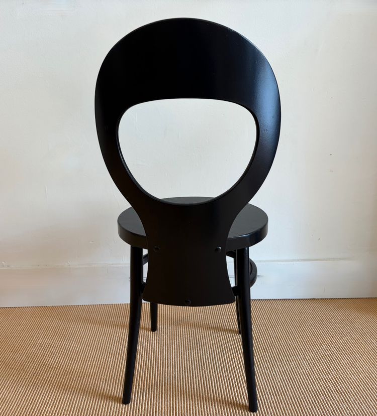 SUITE  DE 4 CHAISES BISTROT BAUMANN LAQUÉES NOIRES.