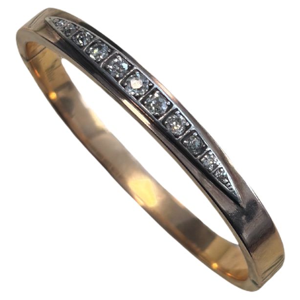 Bracelet rigide ouvrant en or 18k et diamants