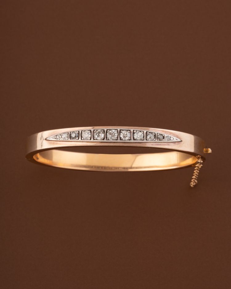 Bracelet rigide ouvrant en or 18k et diamants