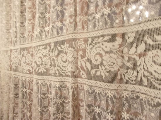 Curtain in embroidered tulle, early 20th century
