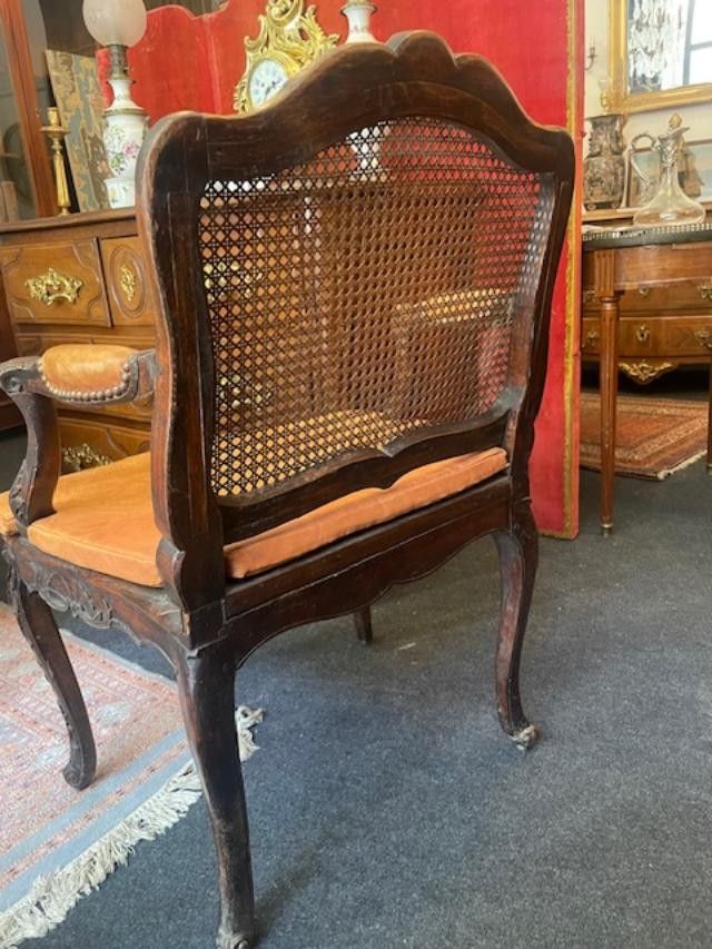 Fauteuil canné en bois naturel d'époque régence