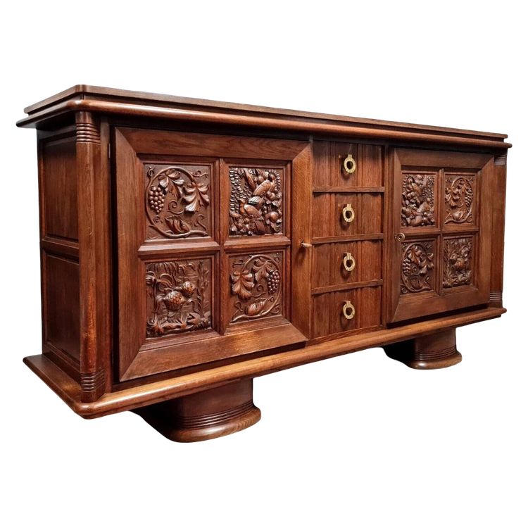 D'aprés Charles Dudouyt : buffet en enfilade en chêne massif