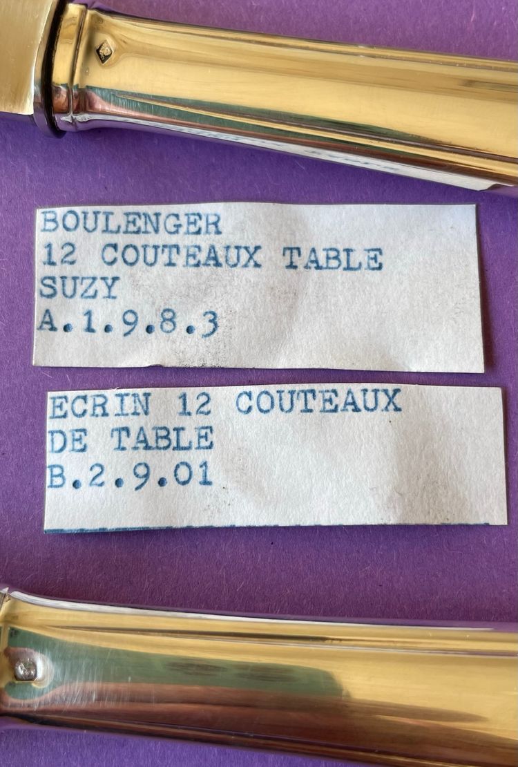12 couteaux de table art déco.