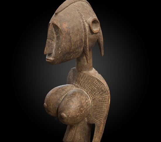 STATUETTE in the style of MOTHERHOOD appearing Ba Fâro Culture Bambara, Mali First half of the 20th century