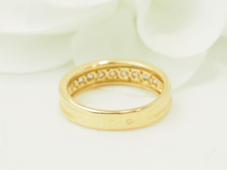 Fede nuziale a mezza eternità in oro giallo 18 carati e diamanti – 0,63 ct