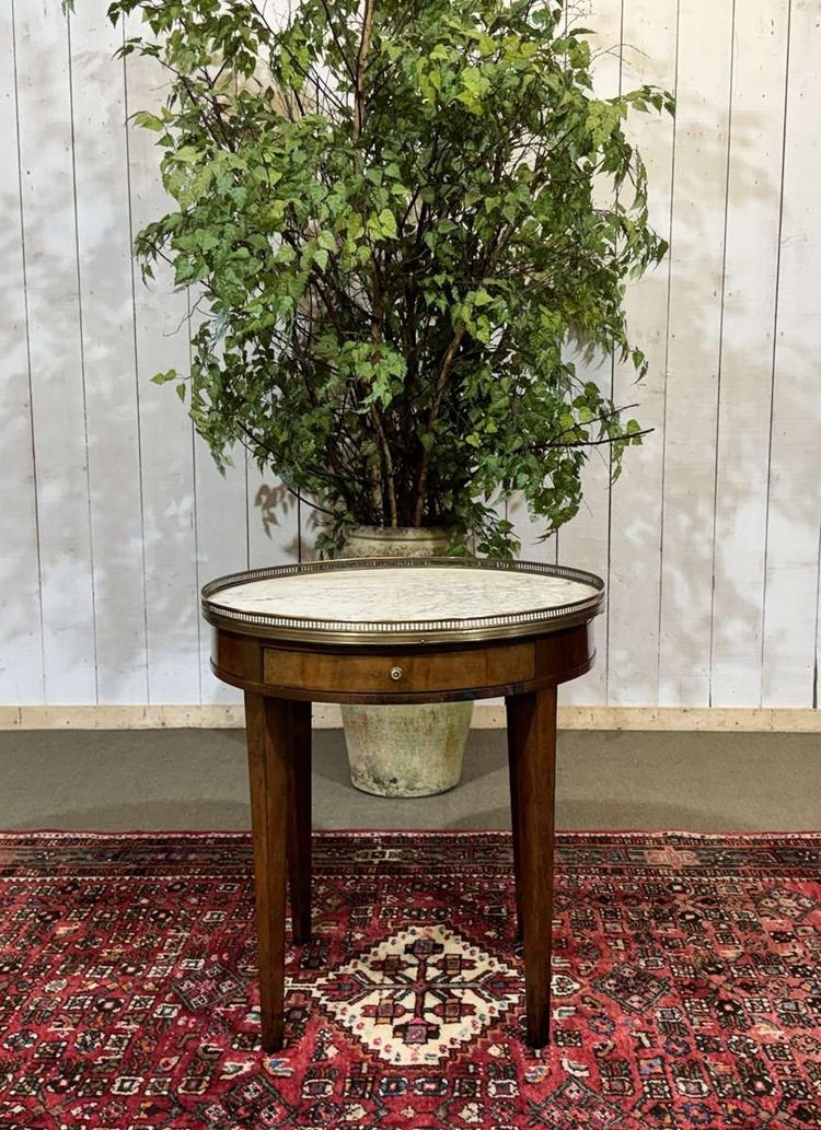 Louis XVI style bouillotte table in mahogany with a white marble top, dating from the 1930s