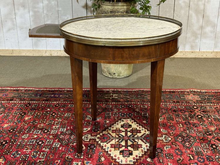 Louis XVI style bouillotte table in mahogany with a white marble top, dating from the 1930s