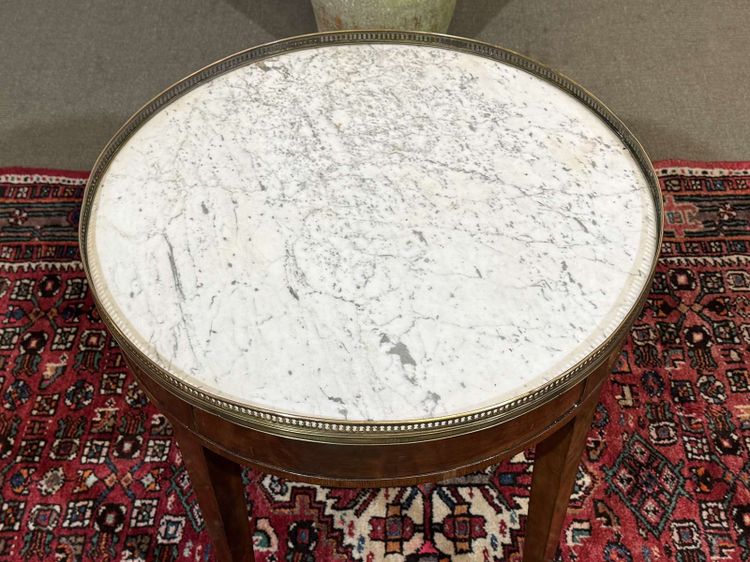 Louis XVI style bouillotte table in mahogany with a white marble top, dating from the 1930s