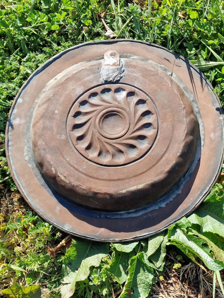 Copper repoussé collection plate, also known as a "quête" plate