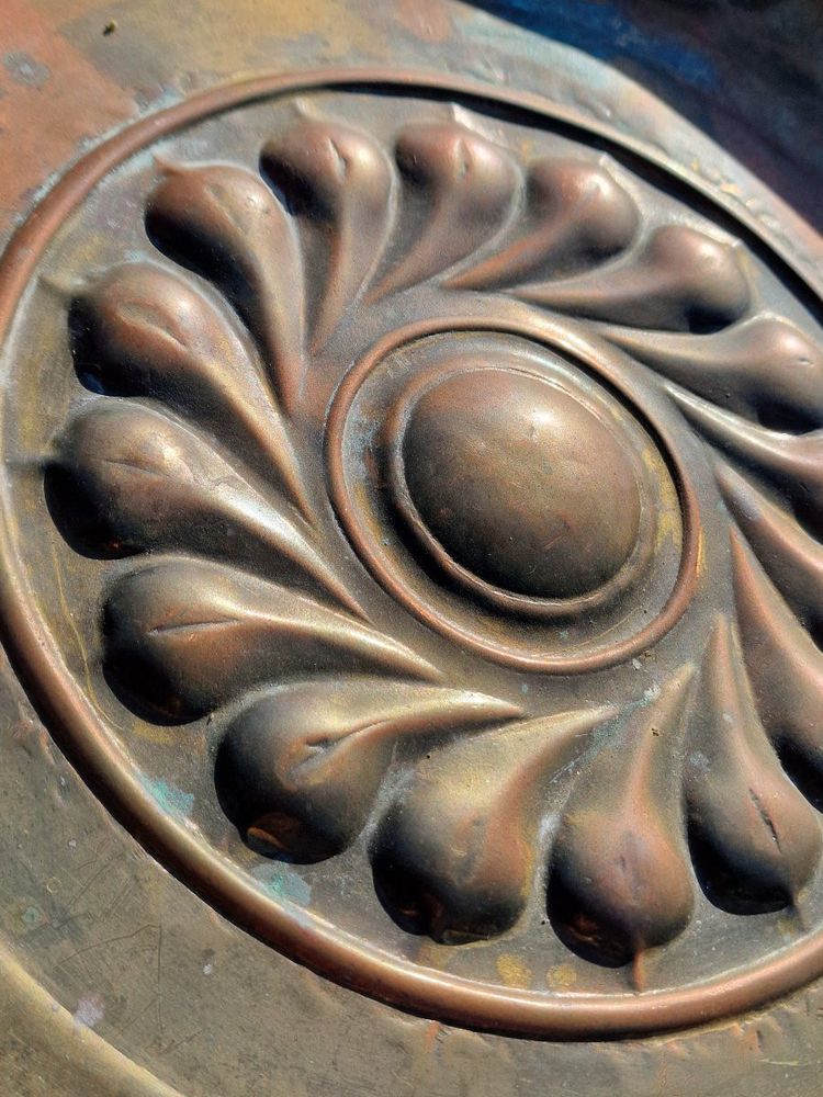 Copper repoussé collection plate, also known as a "quête" plate