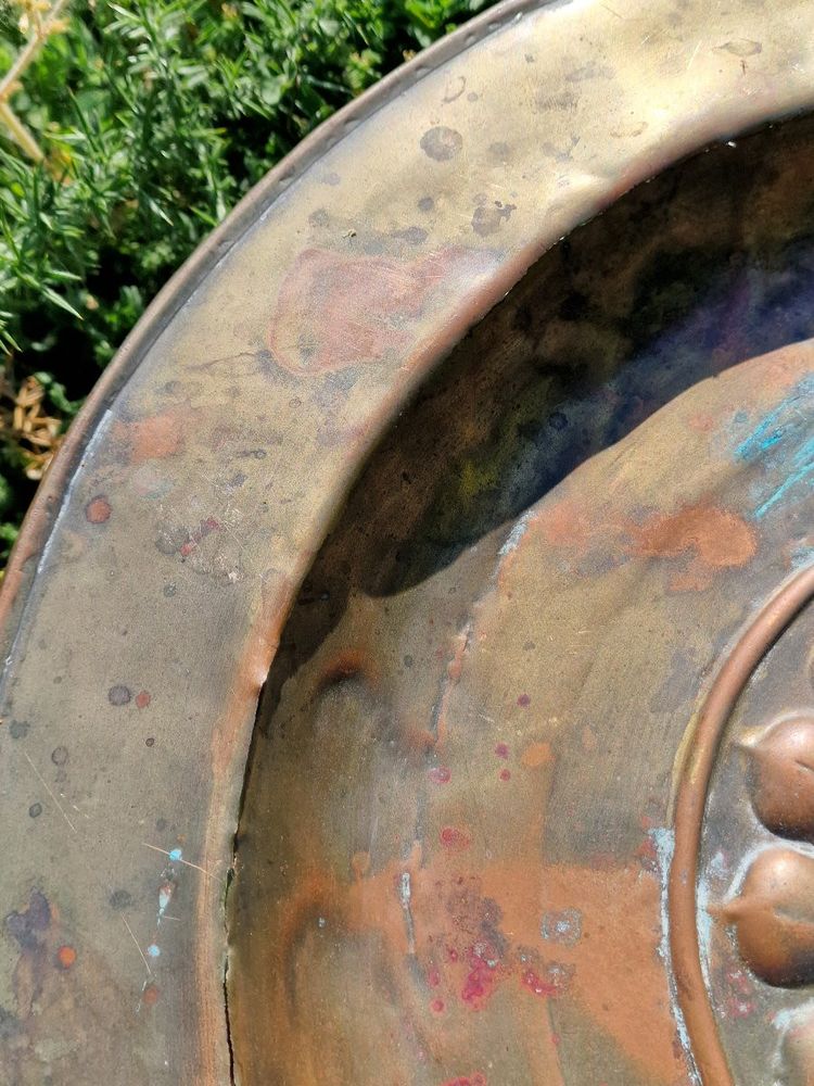 Copper repoussé collection plate, also known as a "quête" plate