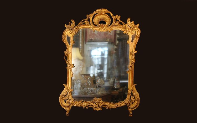 Miroir en bois doré, XVIIIème siècle 