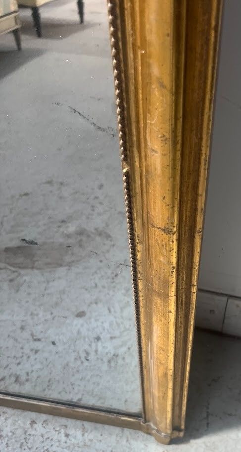 Specchio dorato in stile Rocaille in legno e stucco dorato XIX secolo