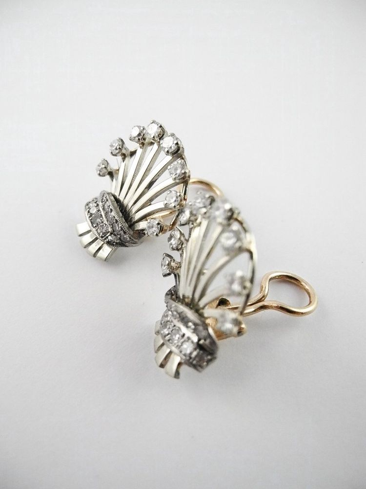 Orecchini a clip a forma di palmetta degli anni '60 con diamanti incastonati in oro bianco e oro giallo.