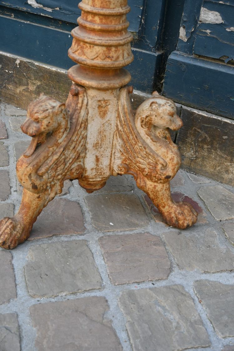 Large cast iron torchiere with griffins from the Restoration XIX period