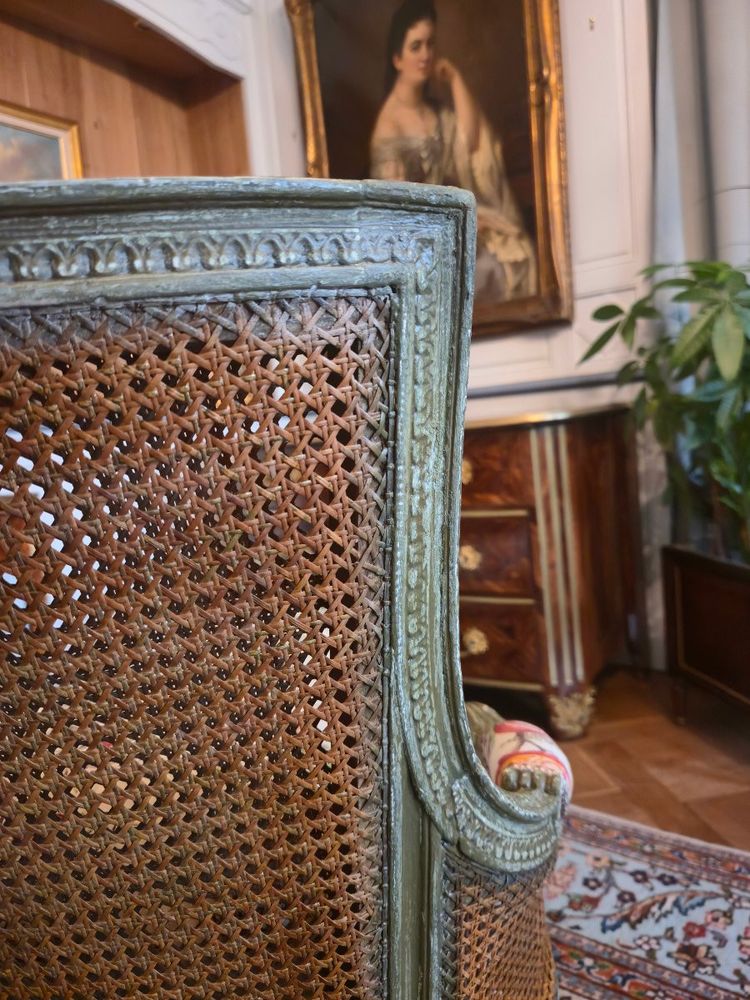Louis XVI style caned chaise longue, late 19th century.
