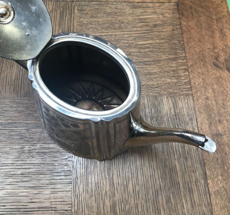 silver-plated metal teapot