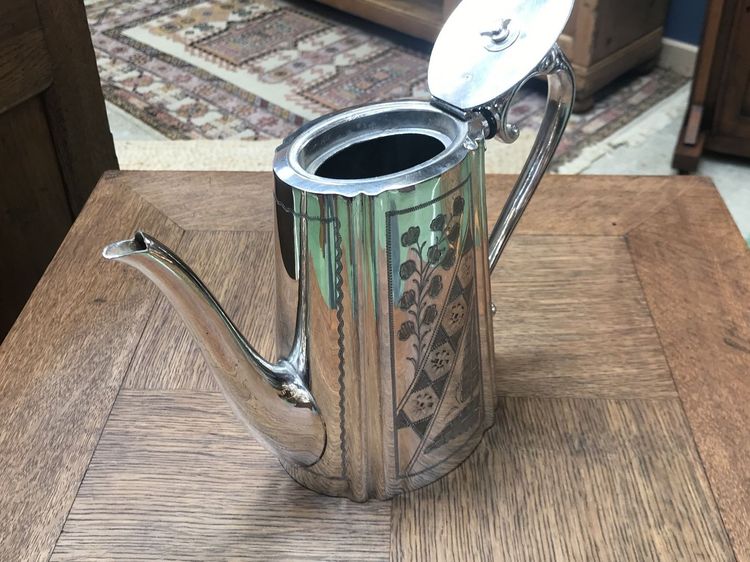 silver-plated metal teapot