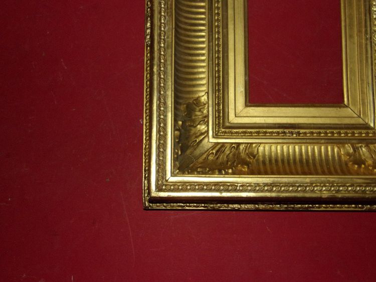 Cornice per canale, XIX secolo, in legno dorato.