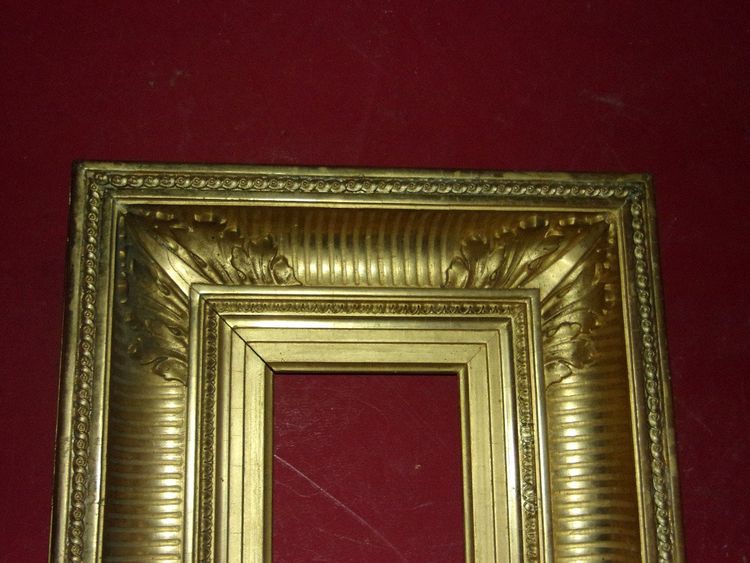 Cornice per canale, XIX secolo, in legno dorato.