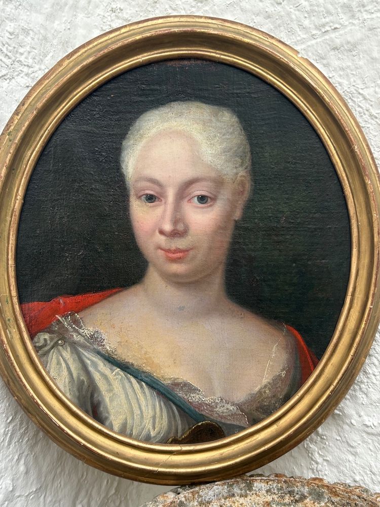 Eighteenth-century oval portrait of a woman, painting on canvas mounted on cardboard