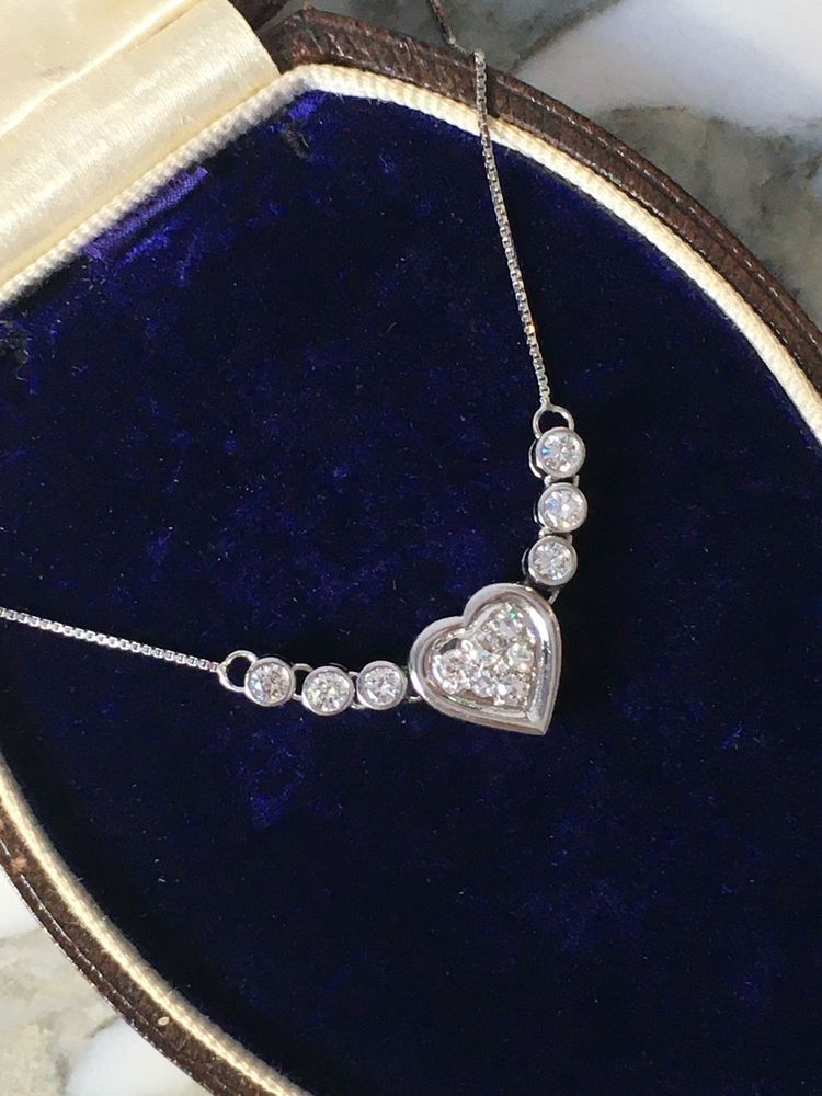 Collier coeur en or blanc 18K et diamants