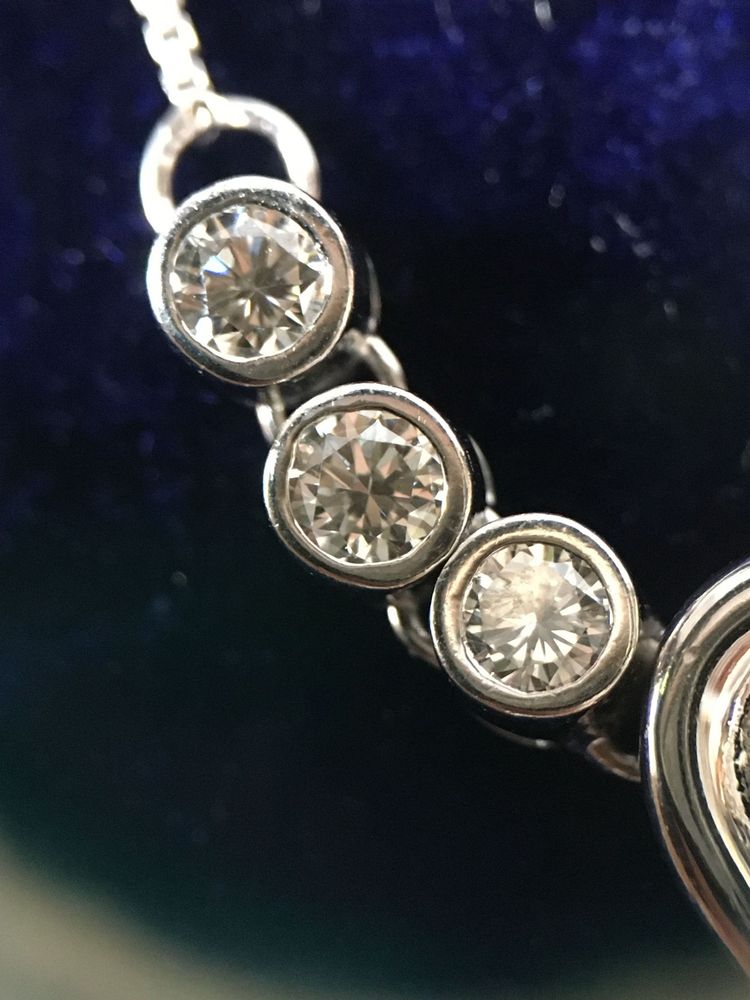Collier coeur en or blanc 18K et diamants