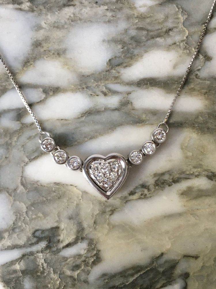Collier coeur en or blanc 18K et diamants