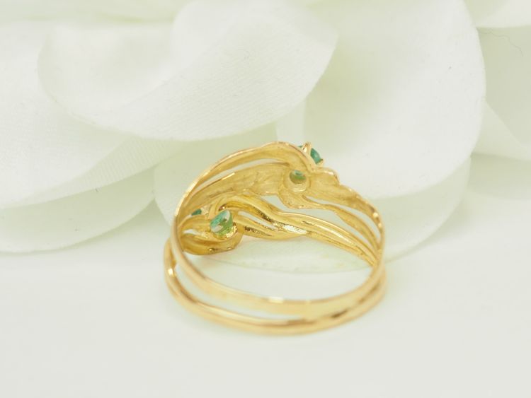 Anello vintage in oro giallo 18 carati con due smeraldi naturali incastonati