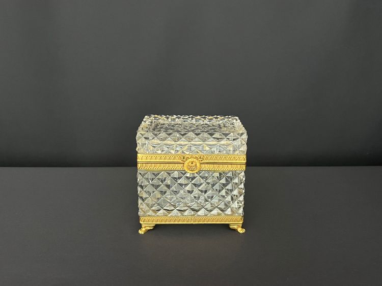 Crystal box with diamond-point cut edges and gold mount