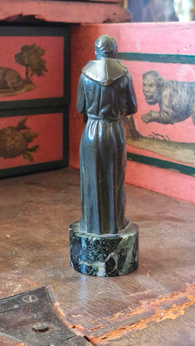 Bronze sculpture depicting a man