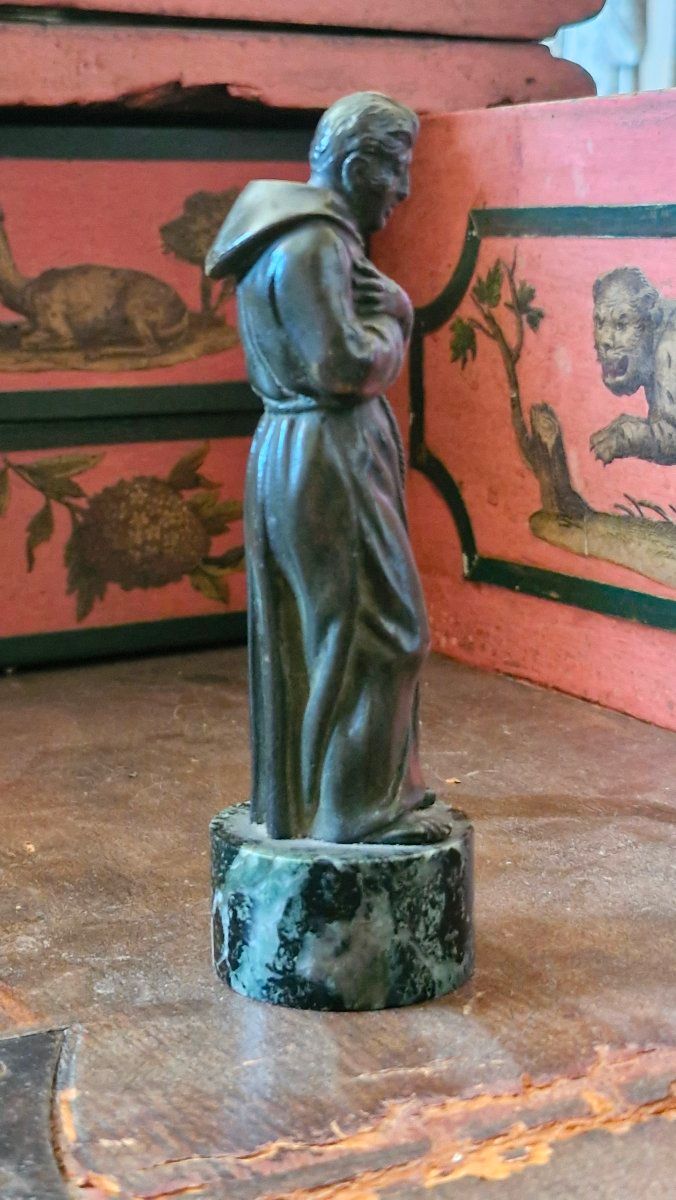 Bronze sculpture depicting a man