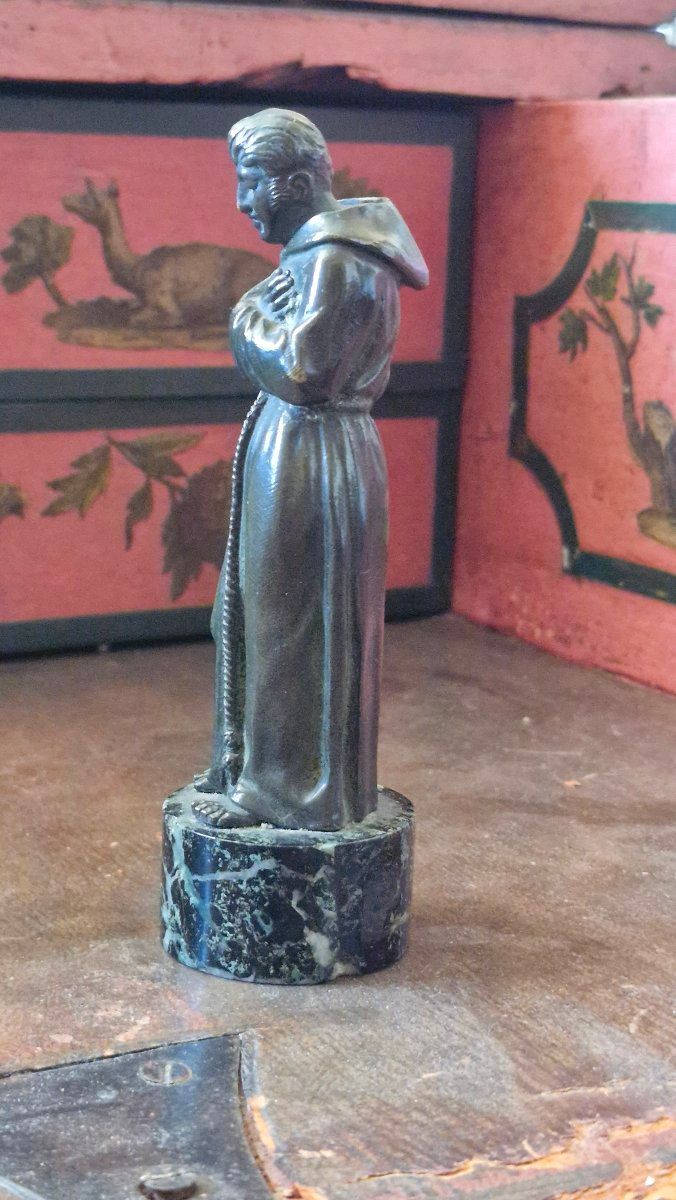 Bronze sculpture depicting a man