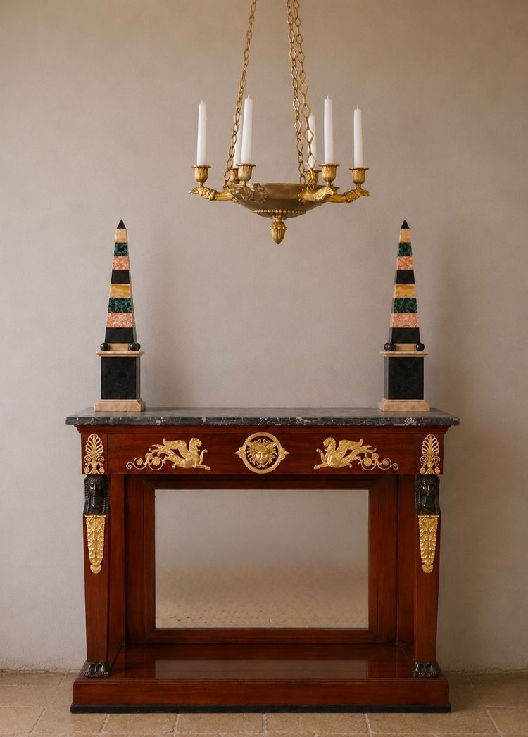 CONSOLE D'ÉPOQUE EMPIRE EN ACAJOU ET BOIS NOIRCI. DÉBUT DU XIXe SIÈCLE