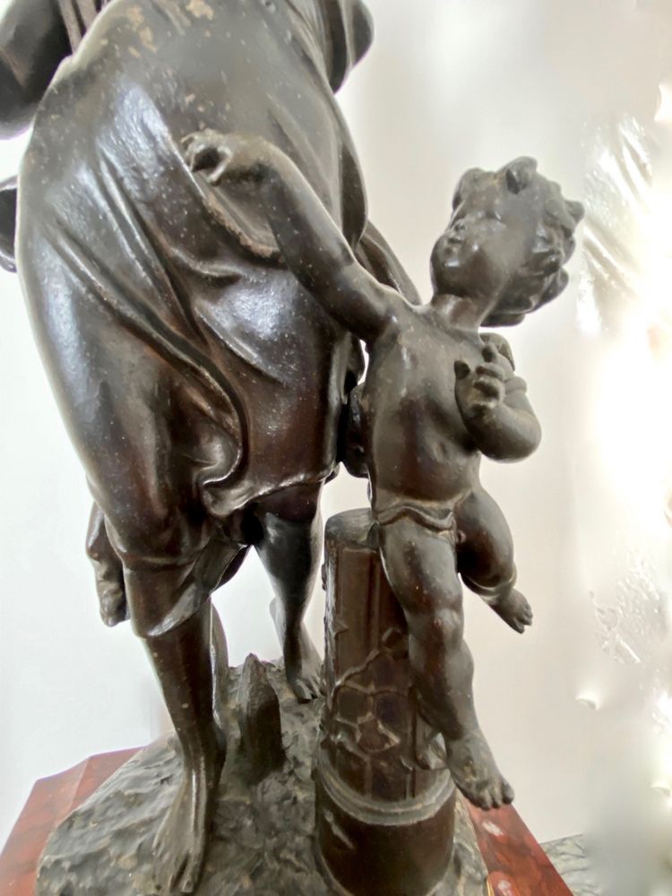 La terre" mantel clock by Charles Anfrie (1833 1905)