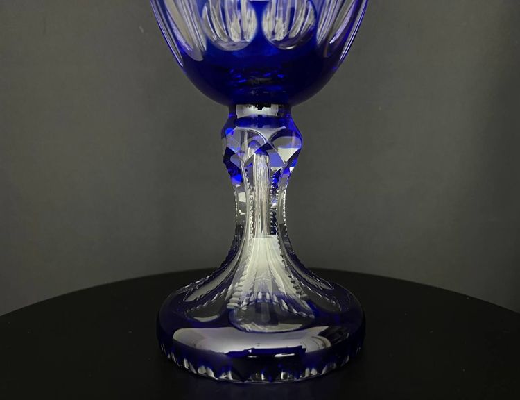 Large covered bowl on foot in cobalt blue lined overlay crystal