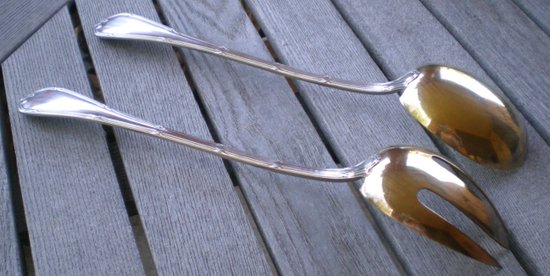 Magnificent salad plate in silver and vermeil model Rubans silversmith Christofle