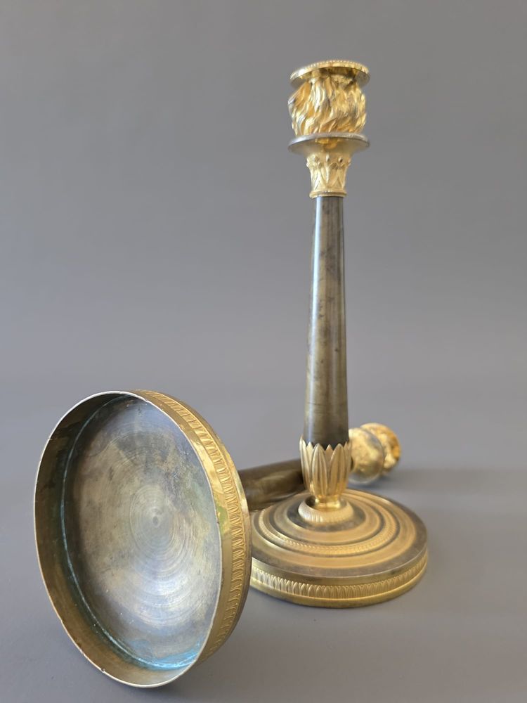  Pair of "flaming" candlesticks, Empire period.