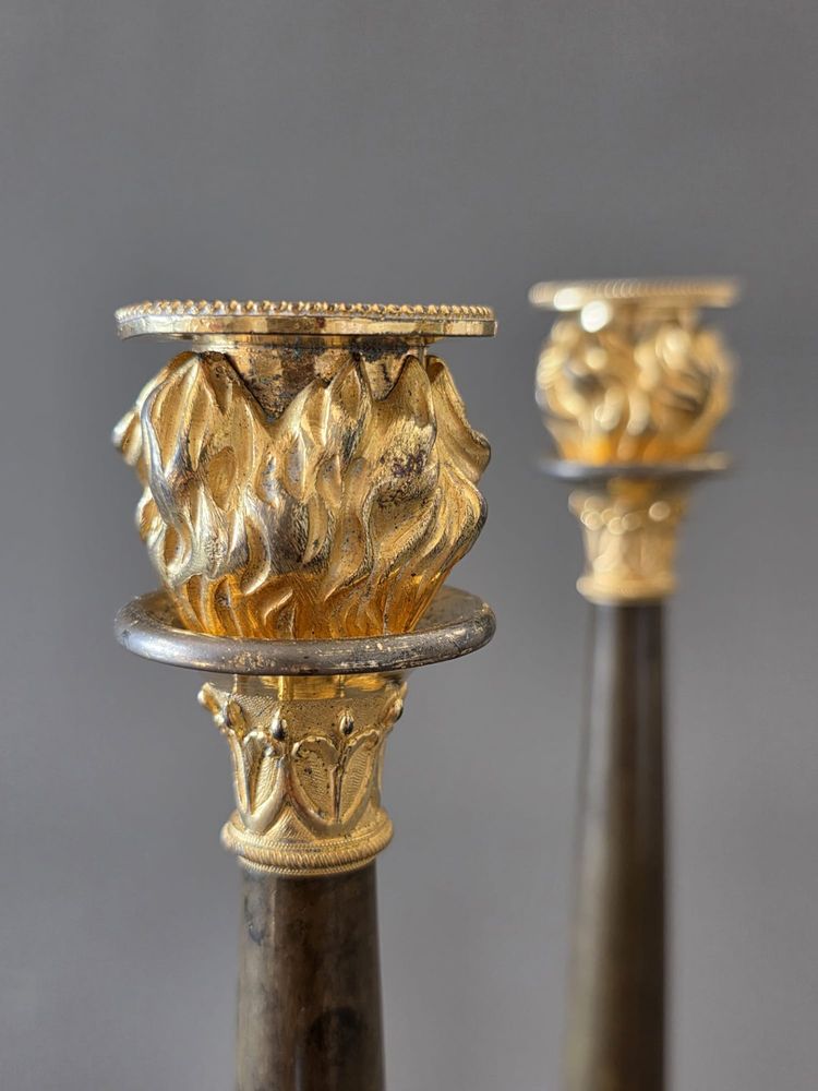  Pair of "flaming" candlesticks, Empire period.