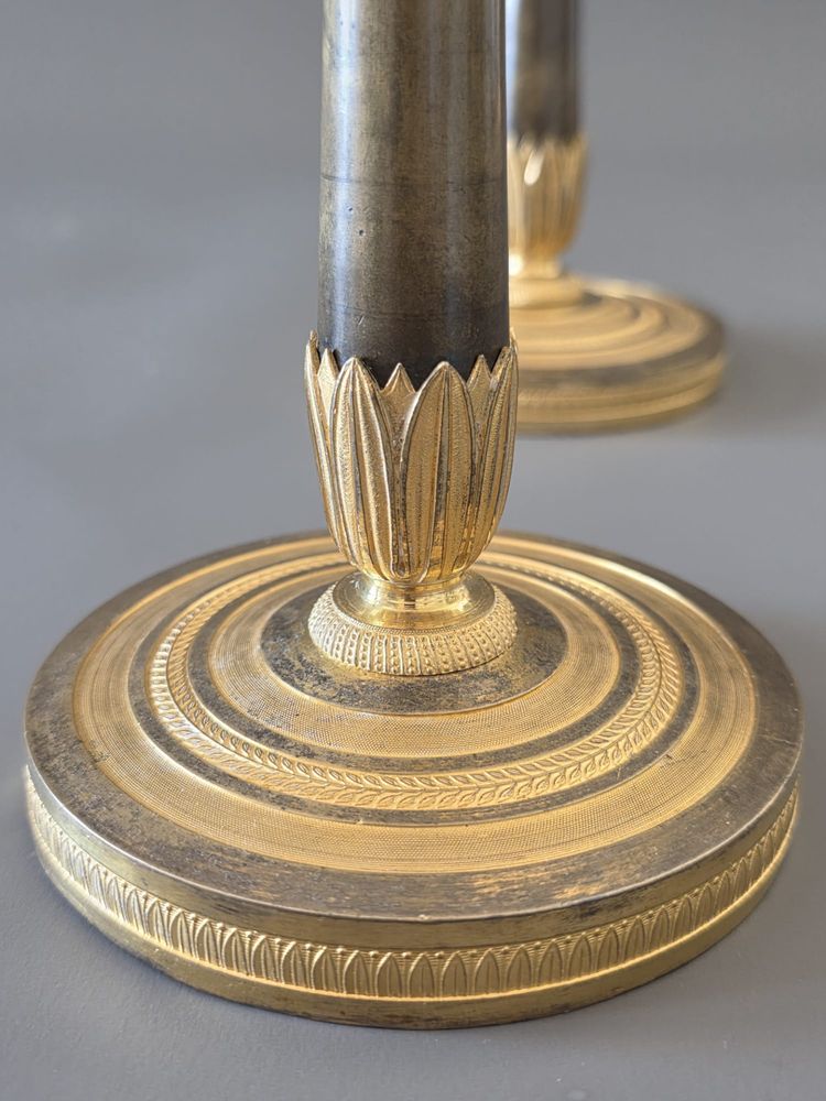  Pair of "flaming" candlesticks, Empire period.