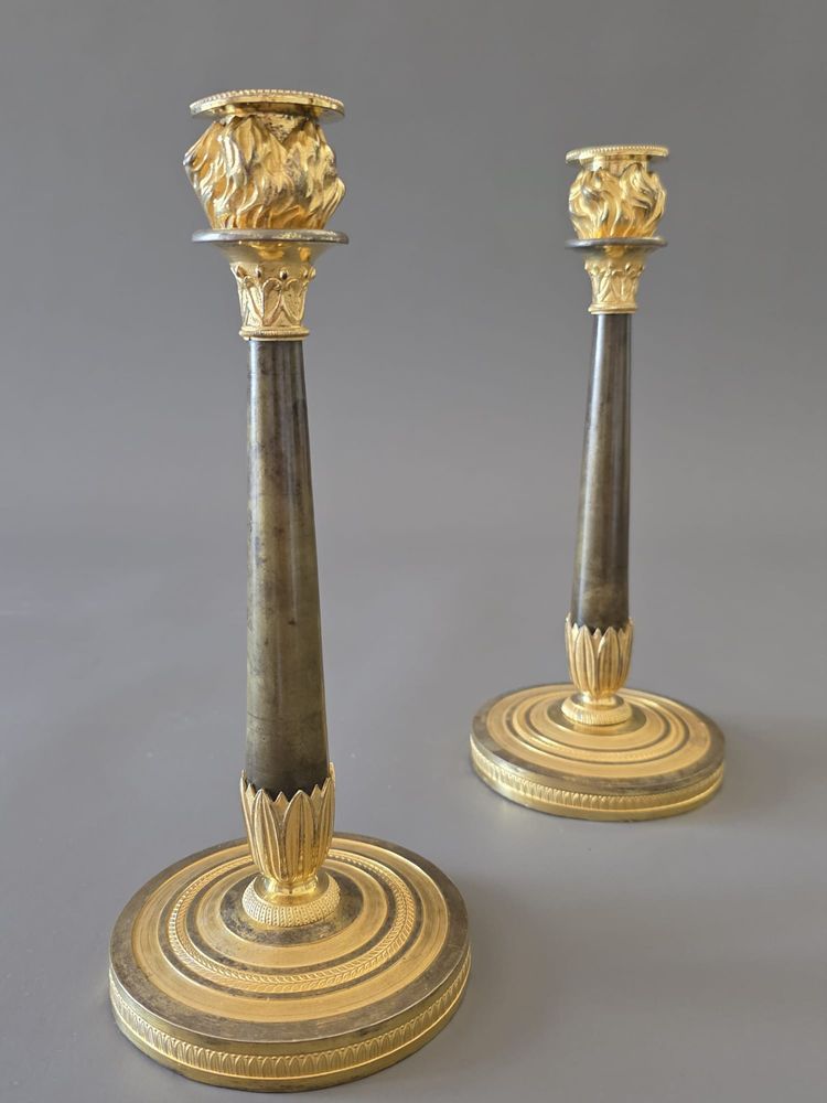  Pair of "flaming" candlesticks, Empire period.