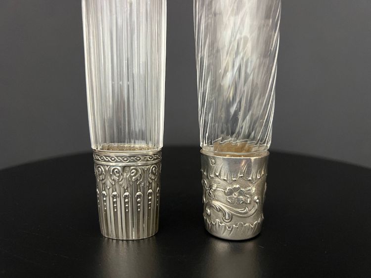Two travel bottles known as "Eau de Mélisse" in cut crystal and solid silver Minerva