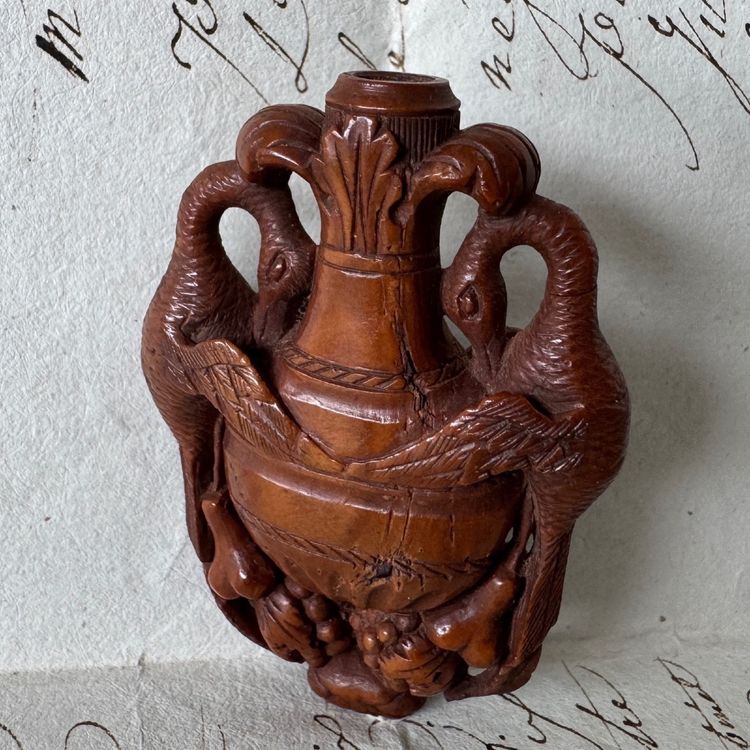 Corozo rocking chair depicting a vase and swans, 19th century