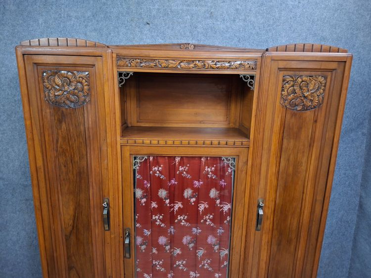 Art Deco bookcase in carved walnut, circa 1930