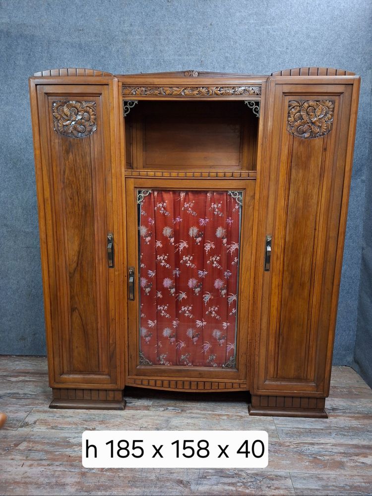 Art Deco bookcase in carved walnut, circa 1930