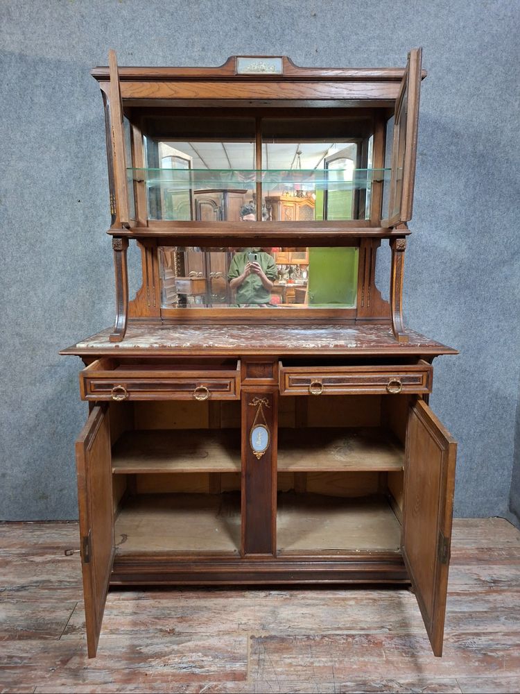 Two-part Louis XVI style oak buffet with an English porcelain plaque.