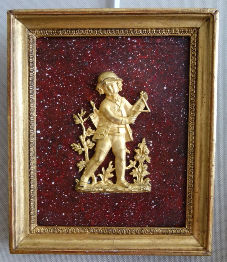 Pair of miniature medallions in mercury-gilt bronze, on a faux porphyry ground - early 19th century