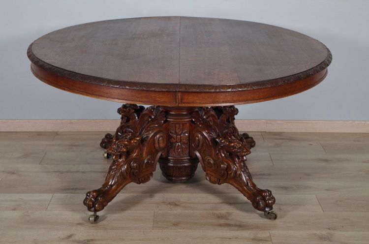 Large Renaissance-style carved oak pedestal table, circa 1900